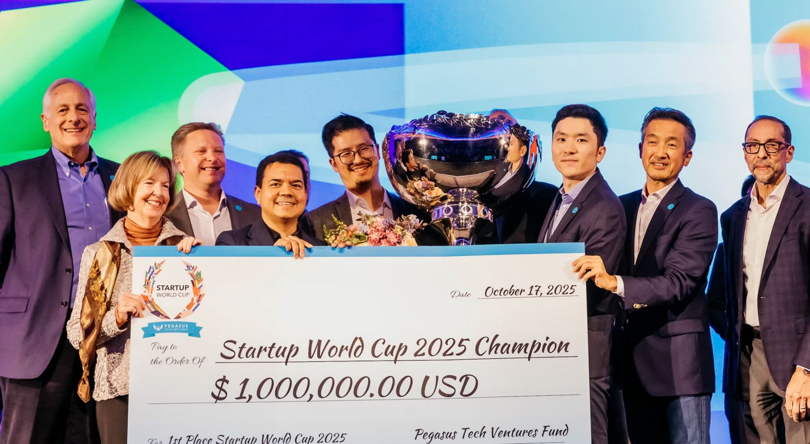 Startup World Cup 2025 Champion receiving the $1,000,000 USD investment prize